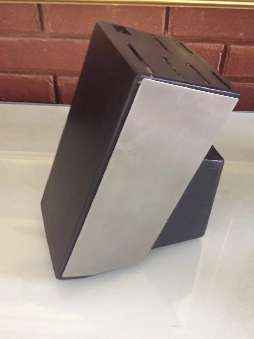 Angled black and silver knife Block